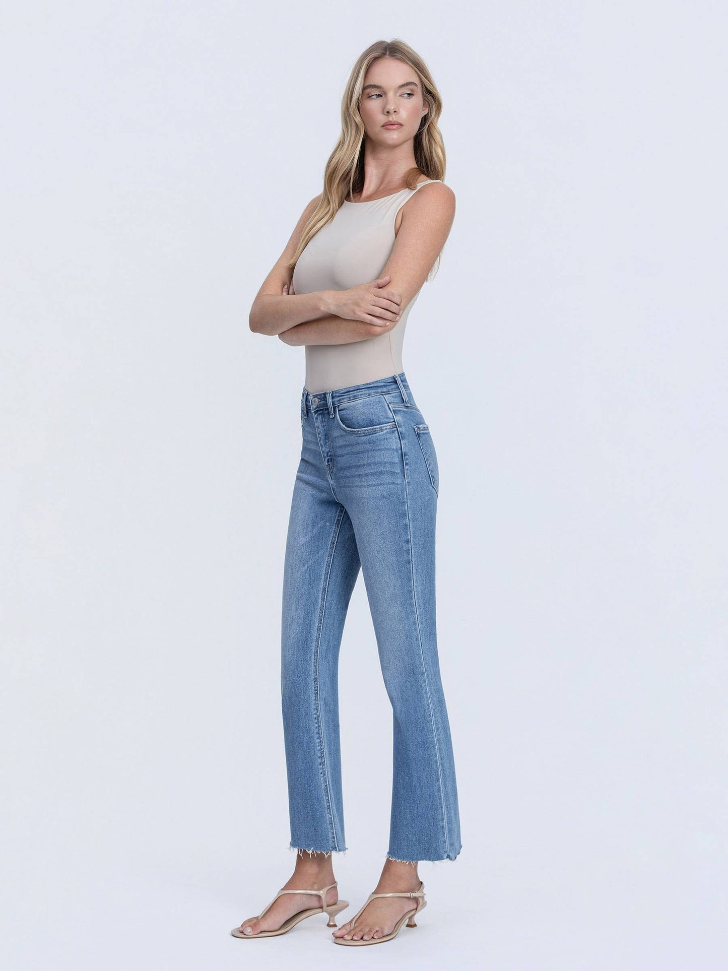 High Rise Raw Hem Crop Flare Jeans