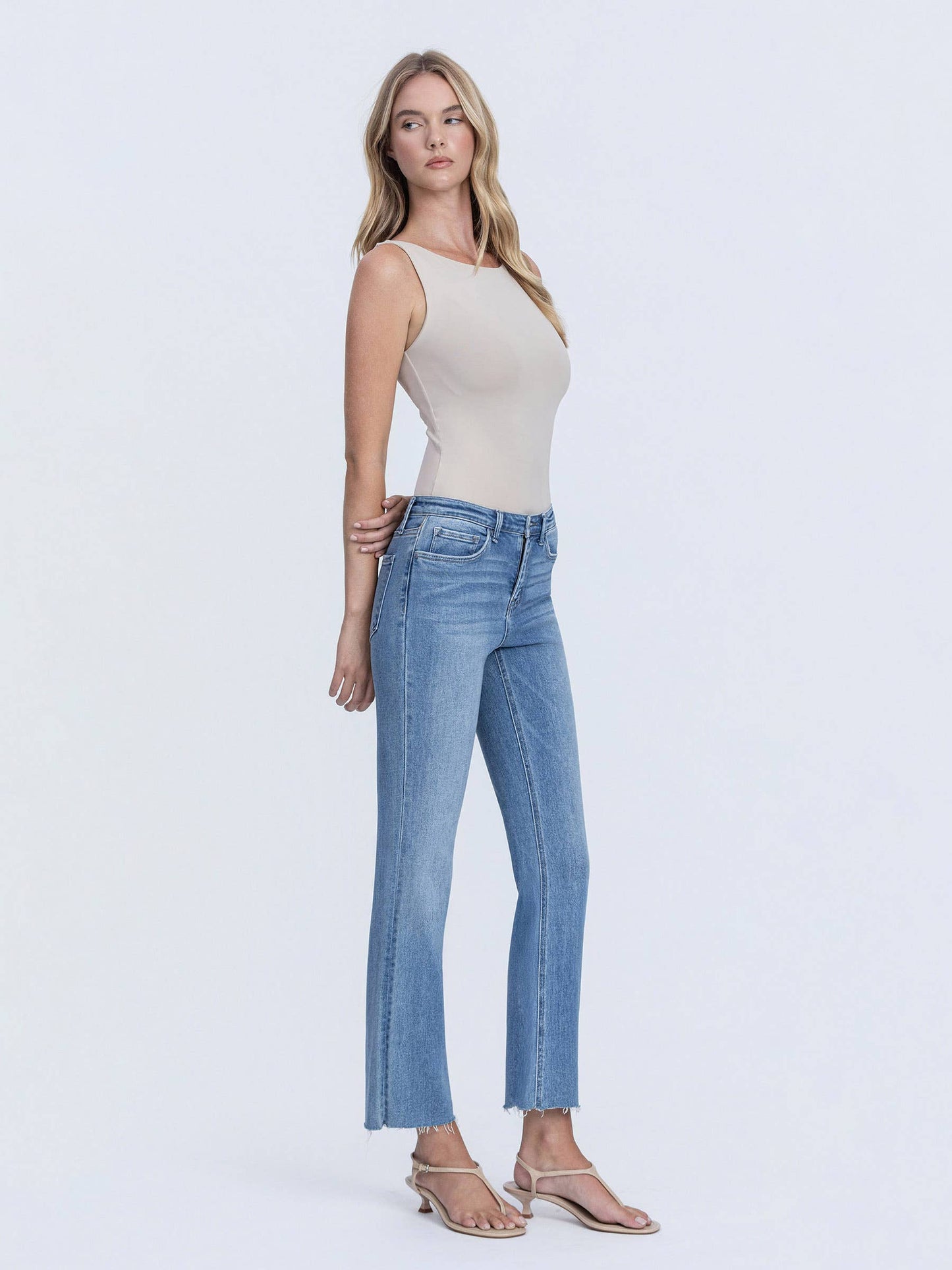 High Rise Raw Hem Crop Flare Jeans