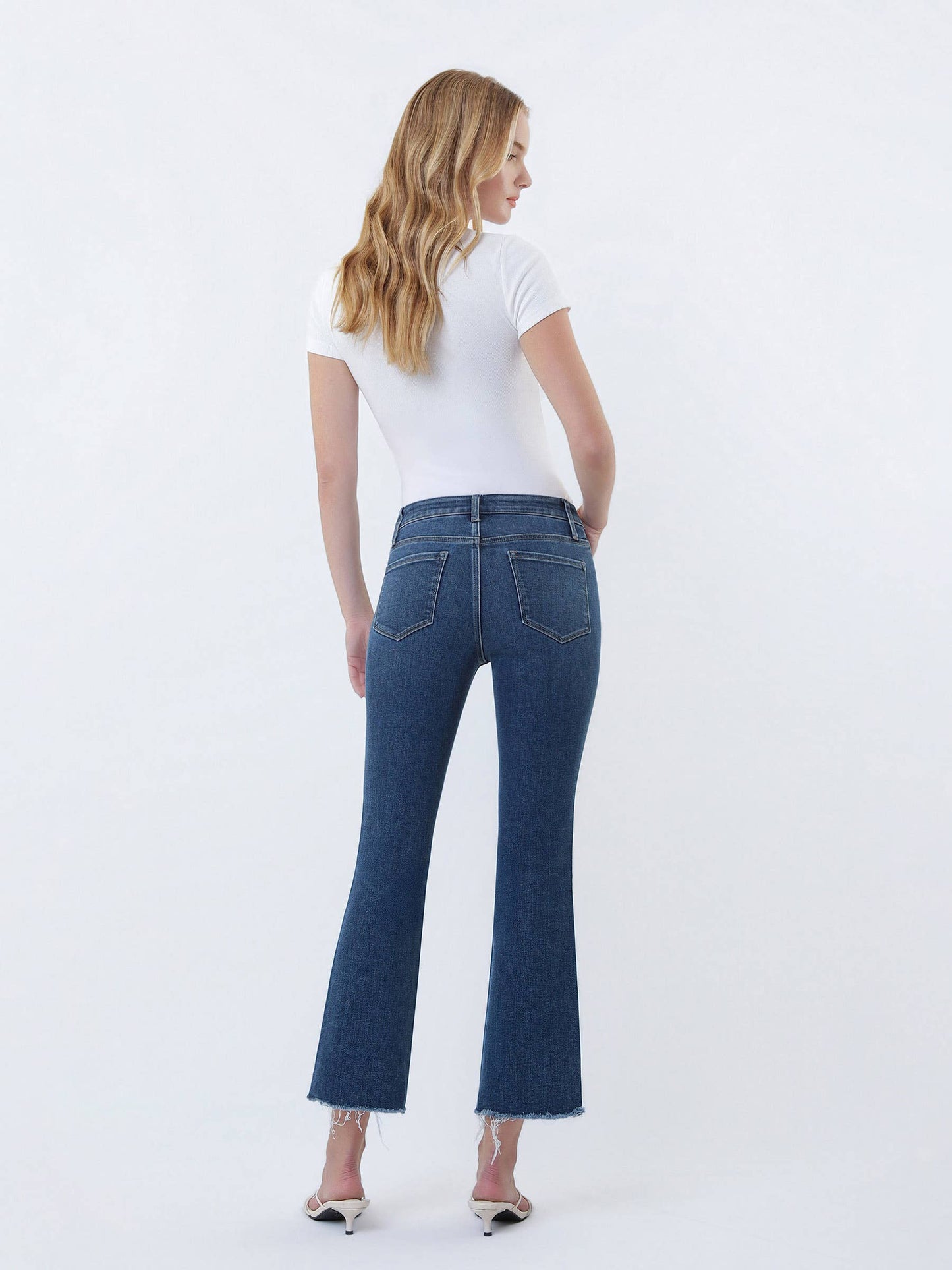 High Rise Raw Step Hem Kick Flare Jeans