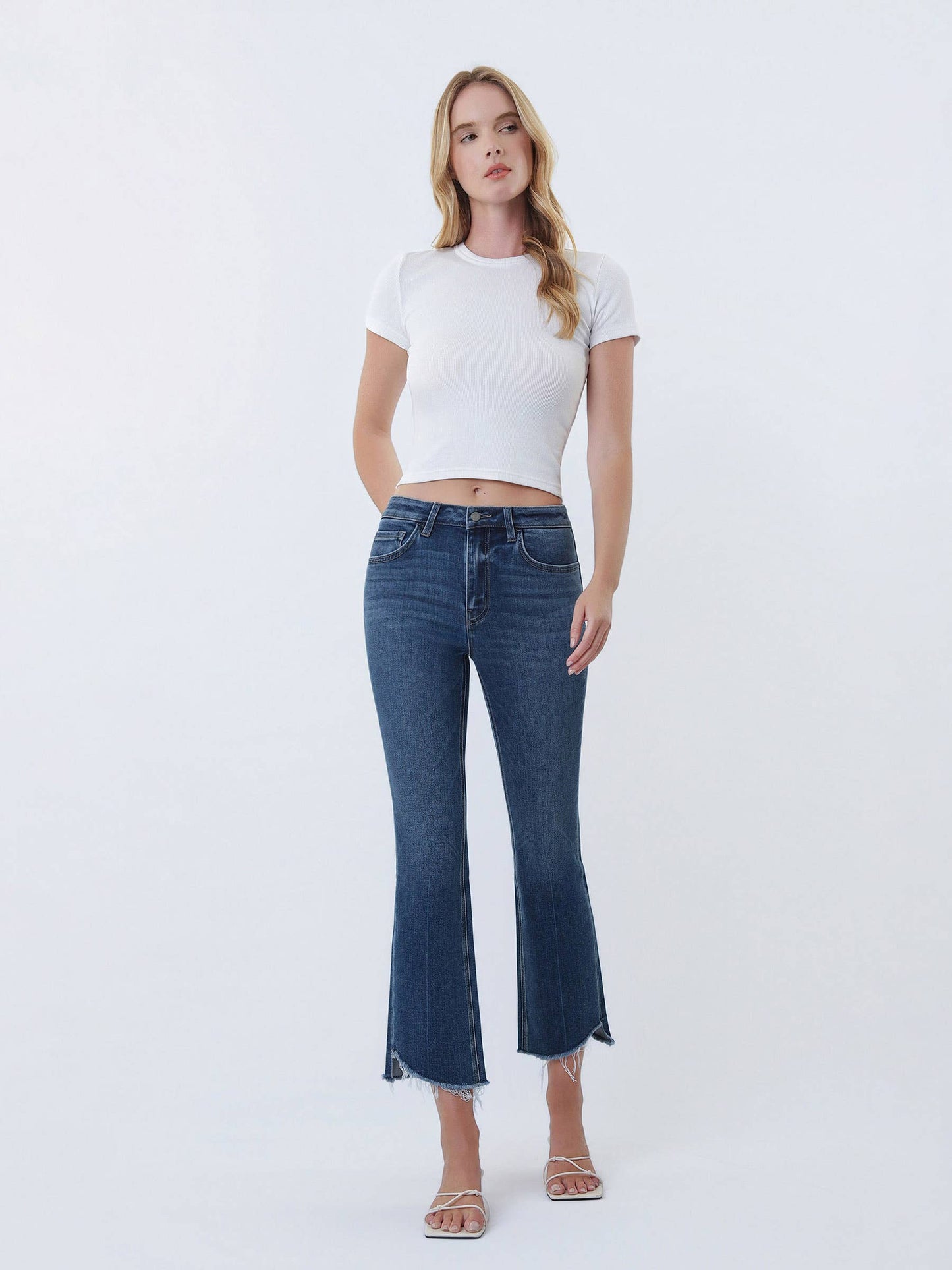 High Rise Raw Step Hem Kick Flare Jeans