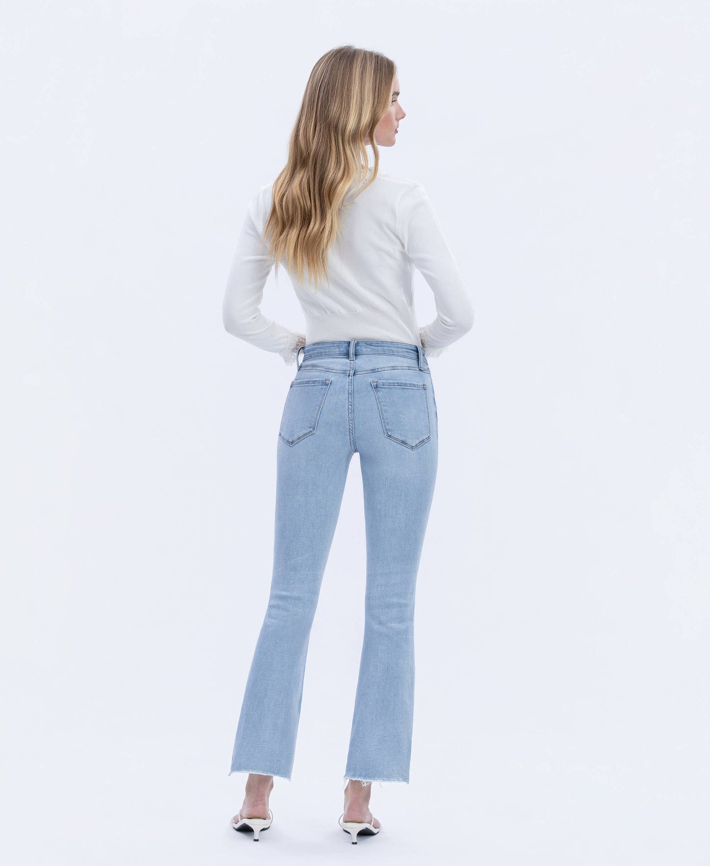High Rise Raw Step Hem Crop Flare Jeans