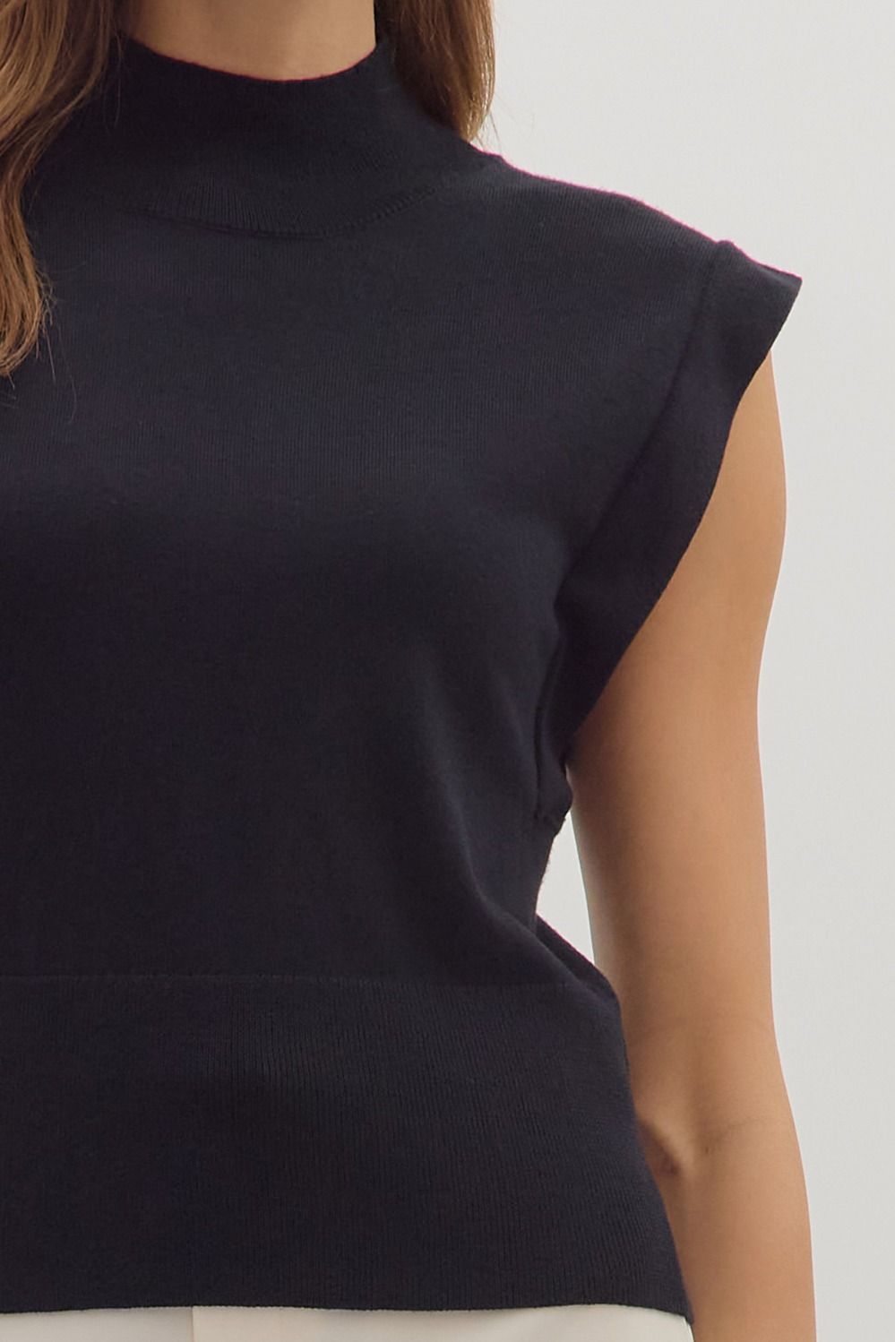 Sleeveless Mock Neck Ribbed Hem Top